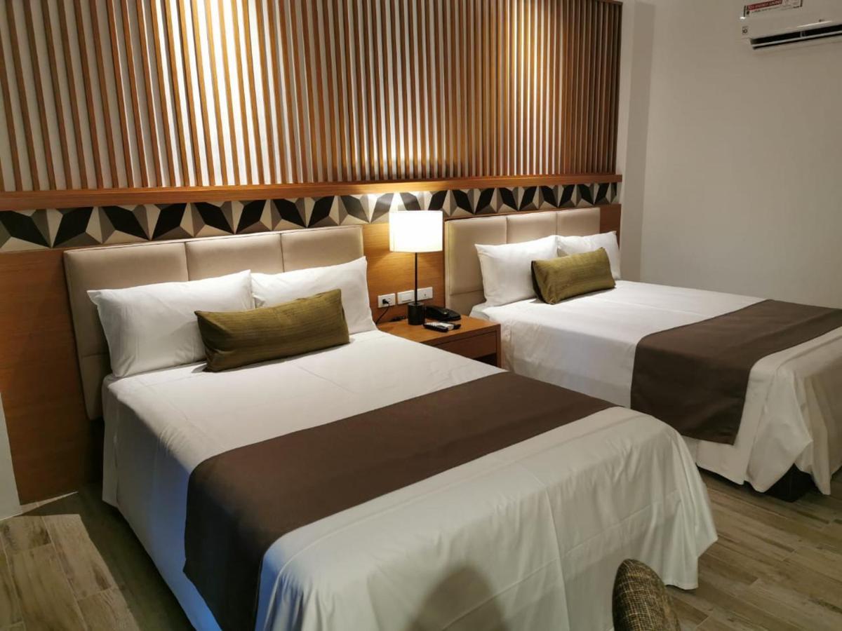 Crown Hotel At Harbour Springs Palawan Managed By Enderun Hotels Puerto Princesa Exterior photo