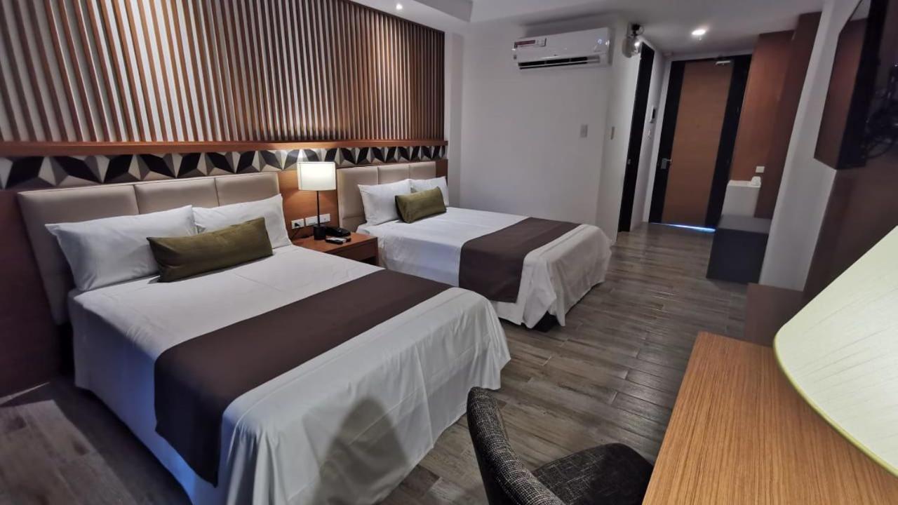Crown Hotel At Harbour Springs Palawan Managed By Enderun Hotels Puerto Princesa Exterior photo